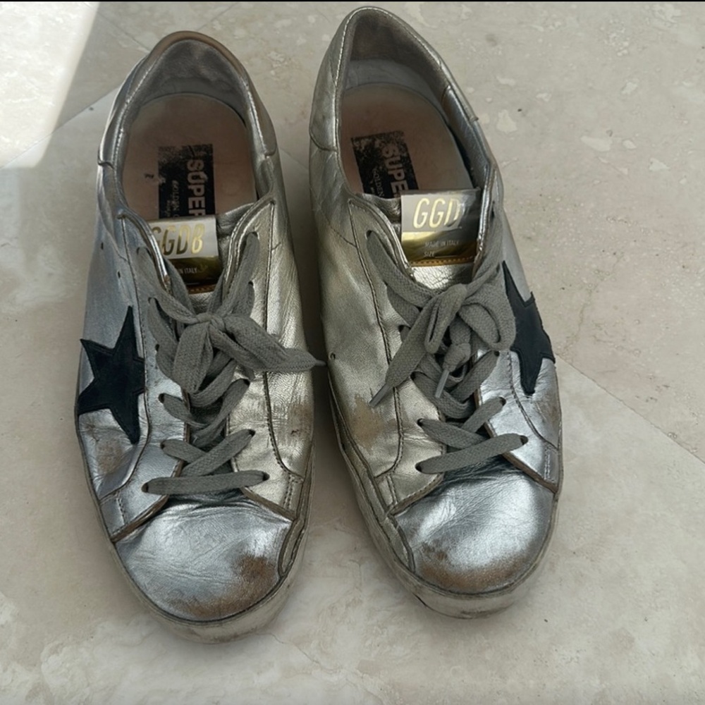 Golden goose platinum gold metallic sneakers black star